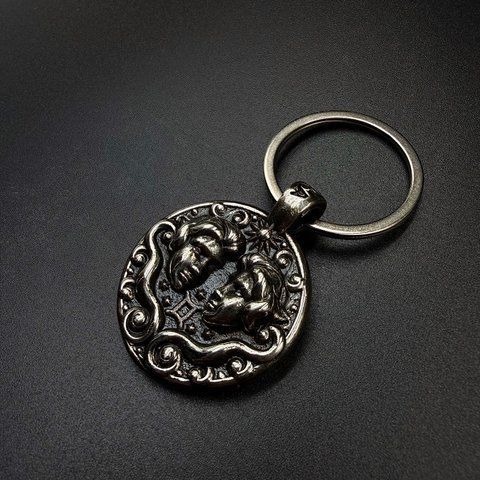 Брелок з нейзильберу знак зодіаку "Близнюки" 9875335675315 фото